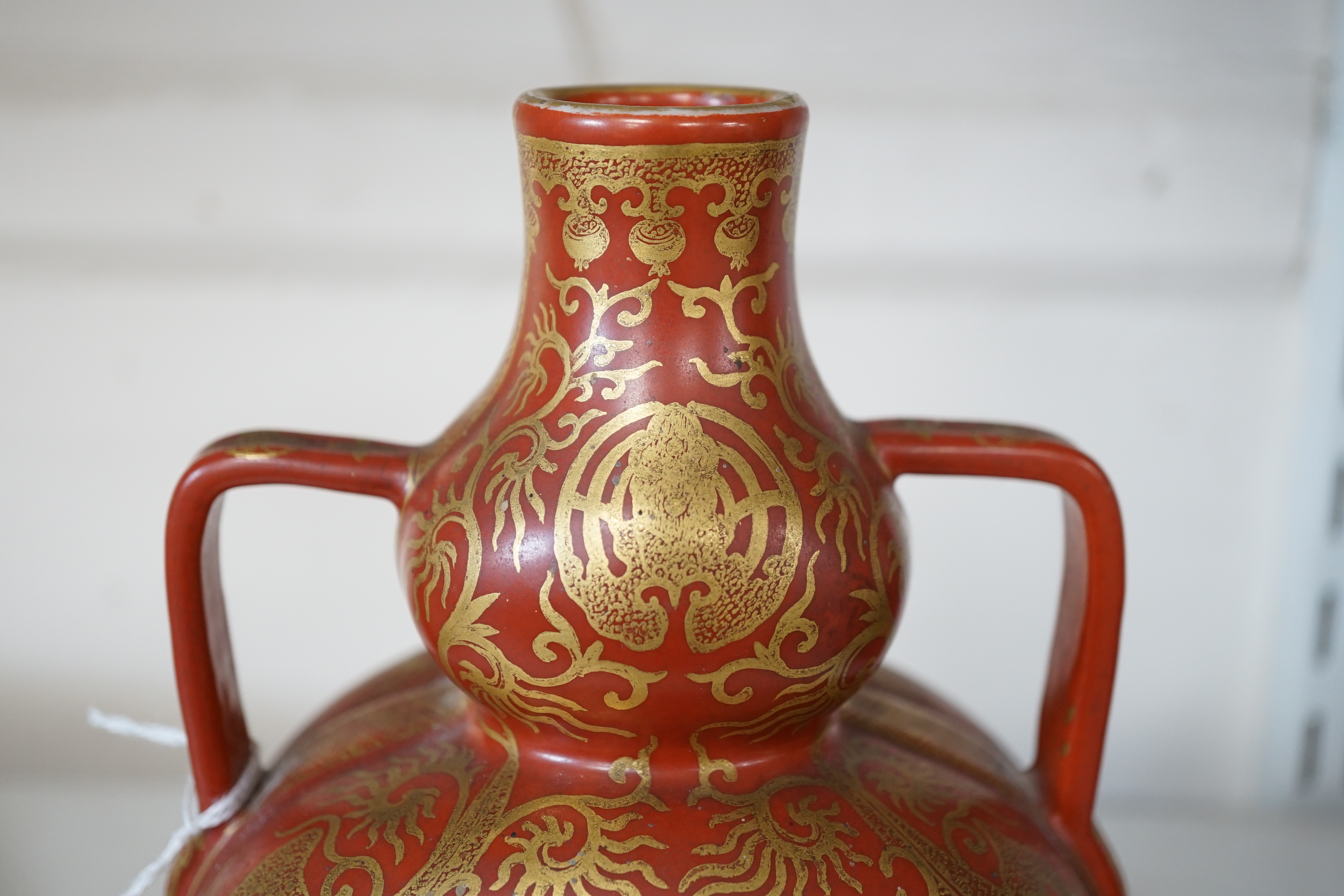 A Chinese gilt decorated coral ground ‘dragon’ vase, 20th century